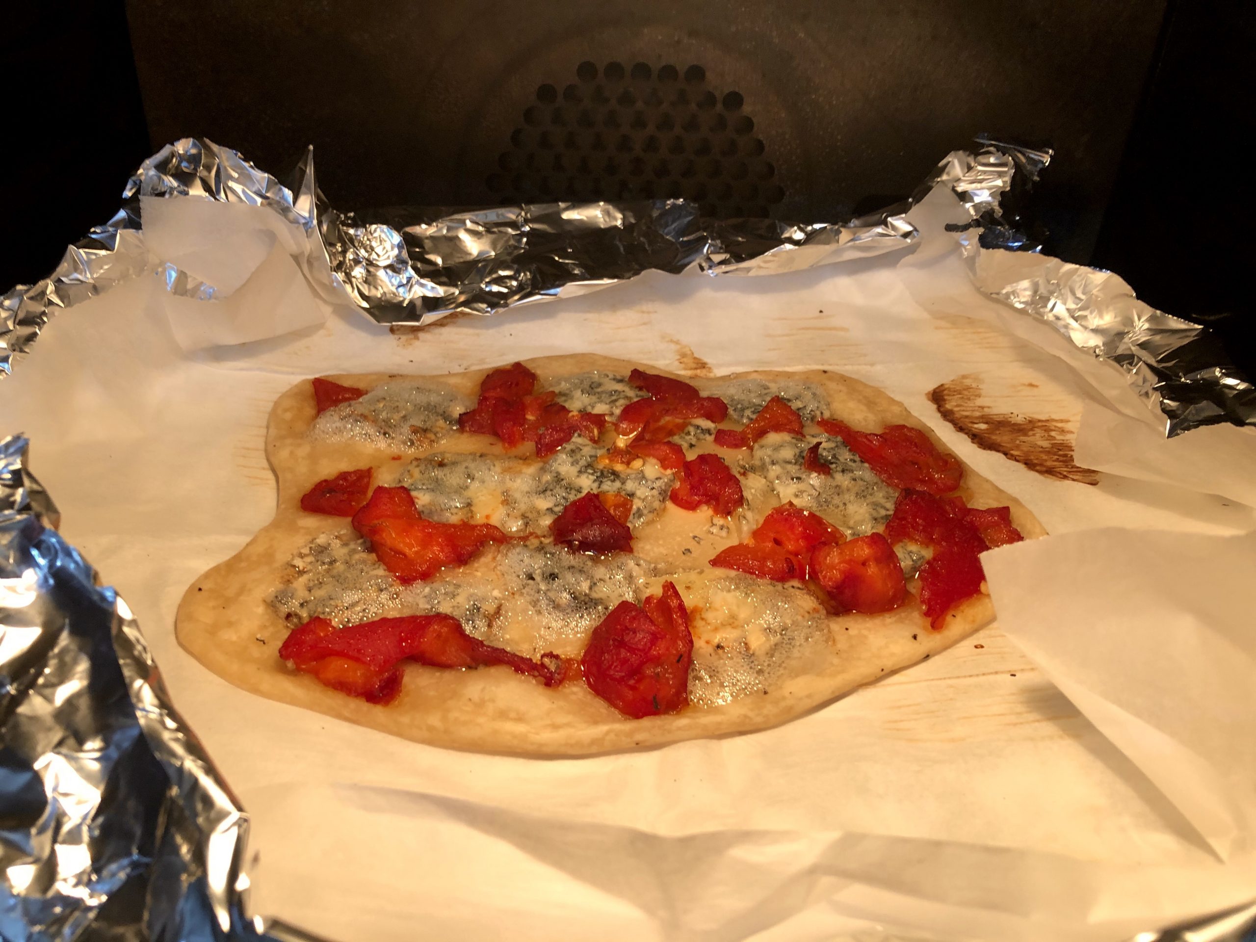 Baking galette with blue cheese and red bell pepper