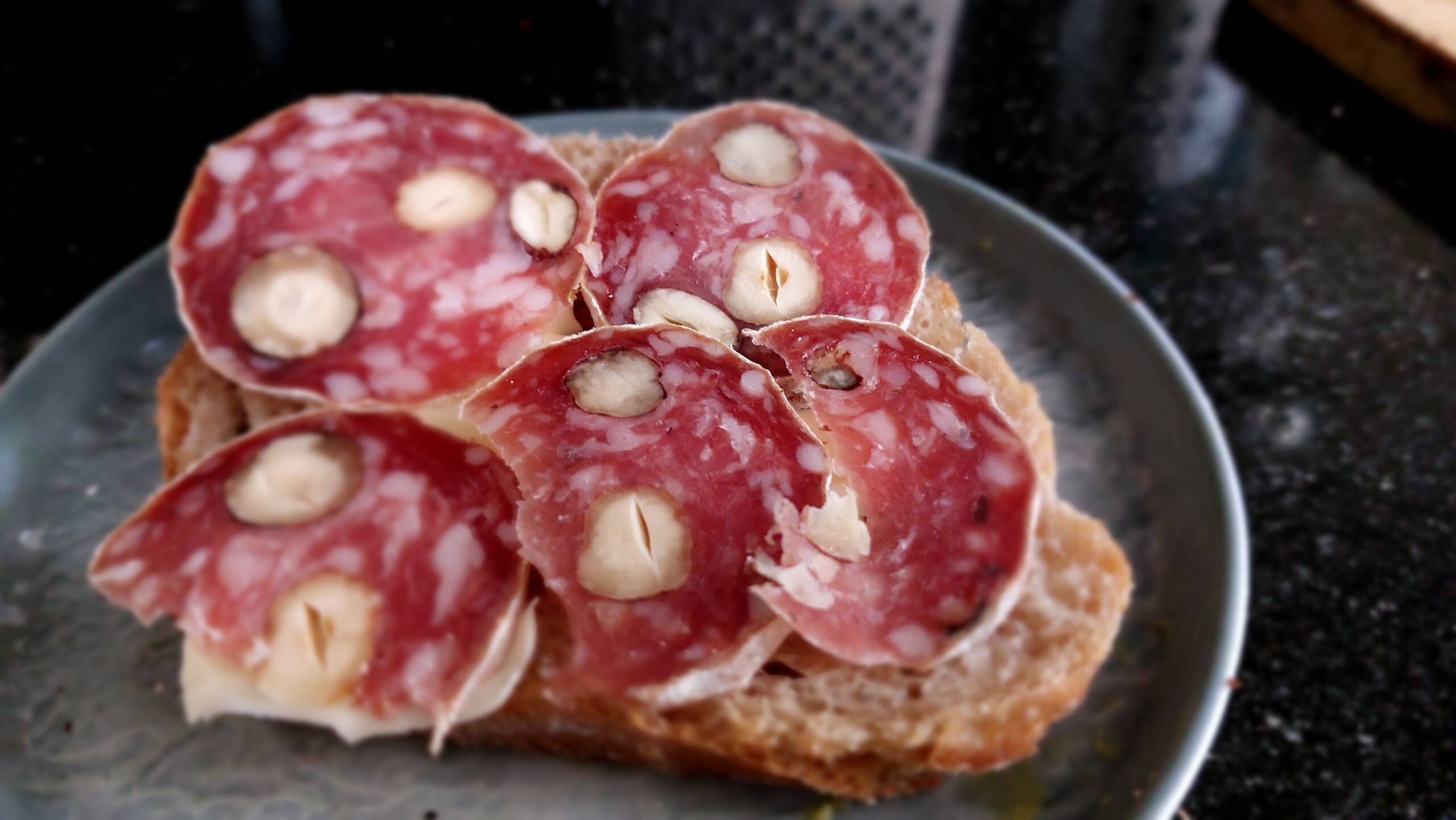Baguette Toast with Cured Salami and Hazelnuts